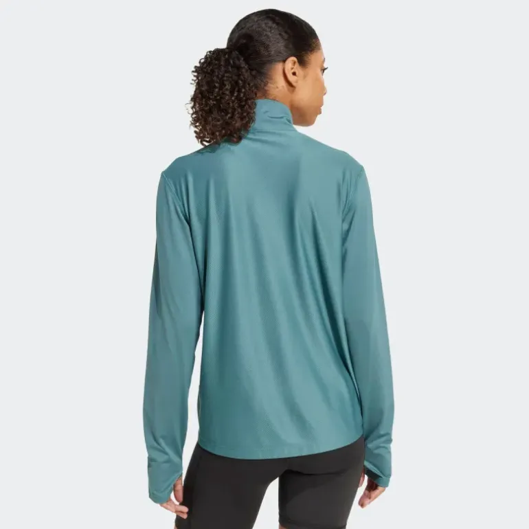VESTE DEMI-ZIP OWN THE RUN FEMME